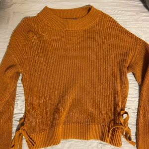 Mustard knit sweater with tie sides